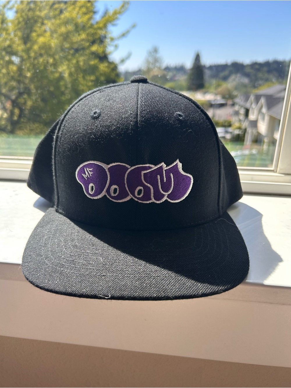 Black Snapback Hat with Purple Bubble Logo